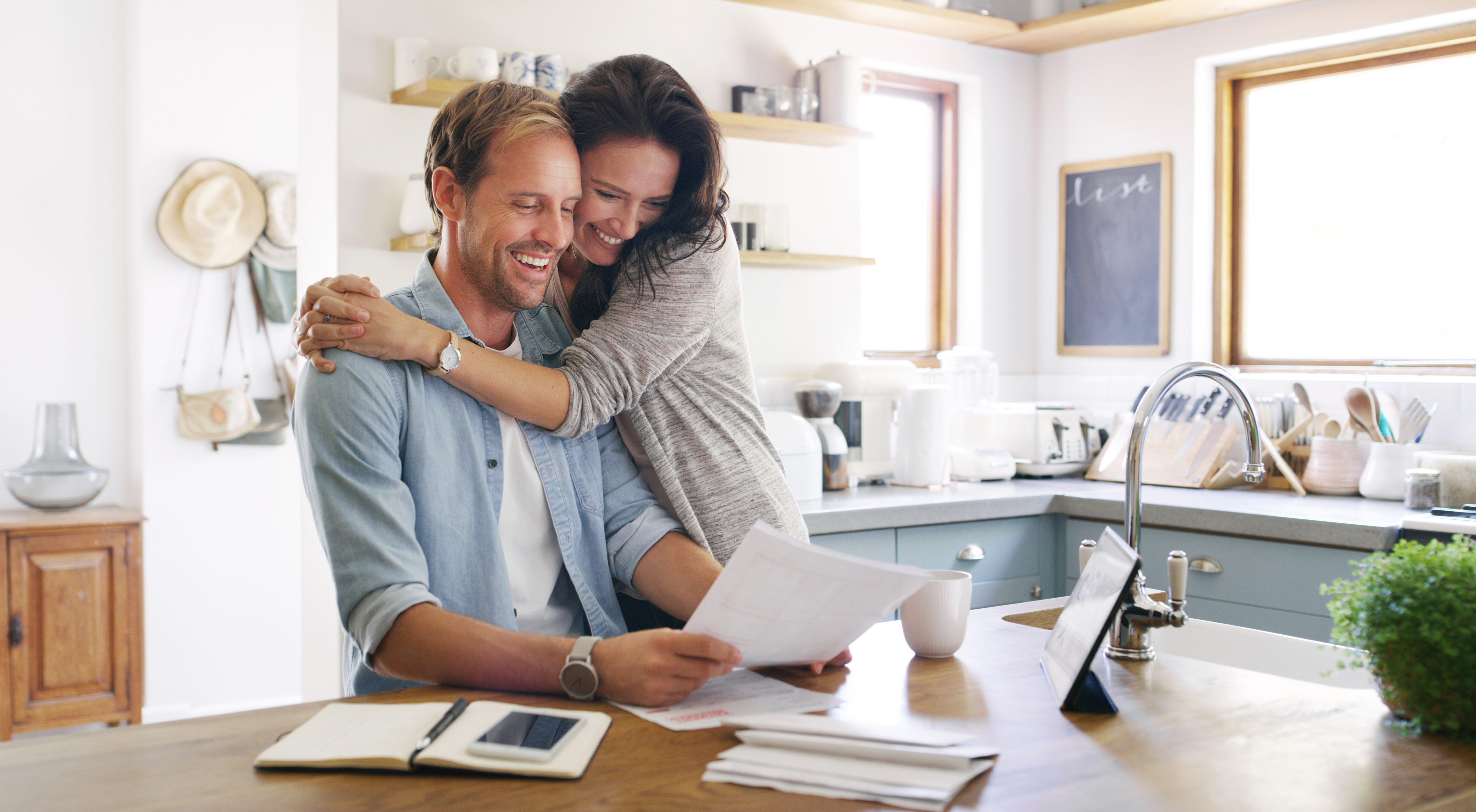 Florida couple reviewing health coverage paperwork after a job change with a licensed local advisor