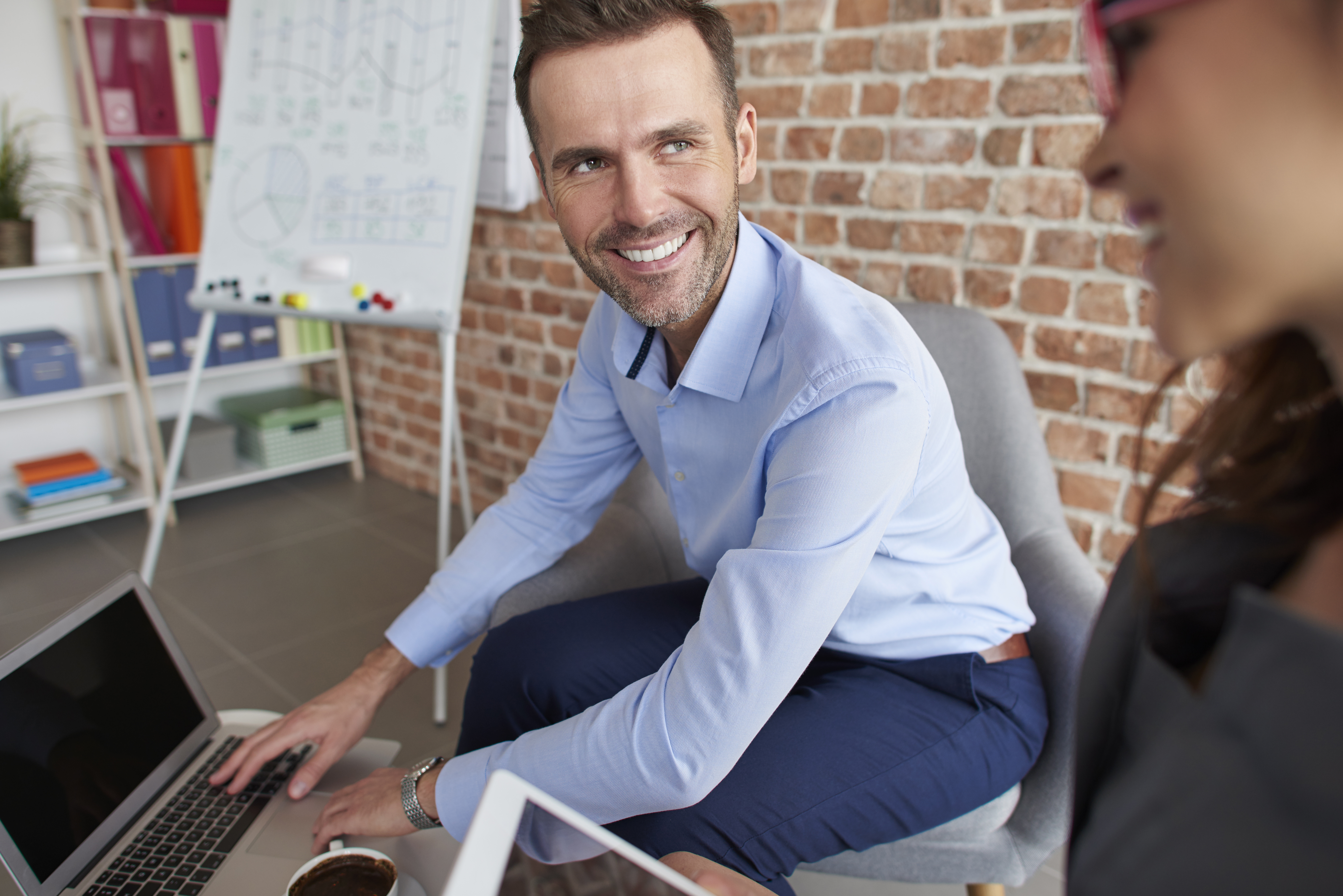 Business team reviewing documents together at an office desk
