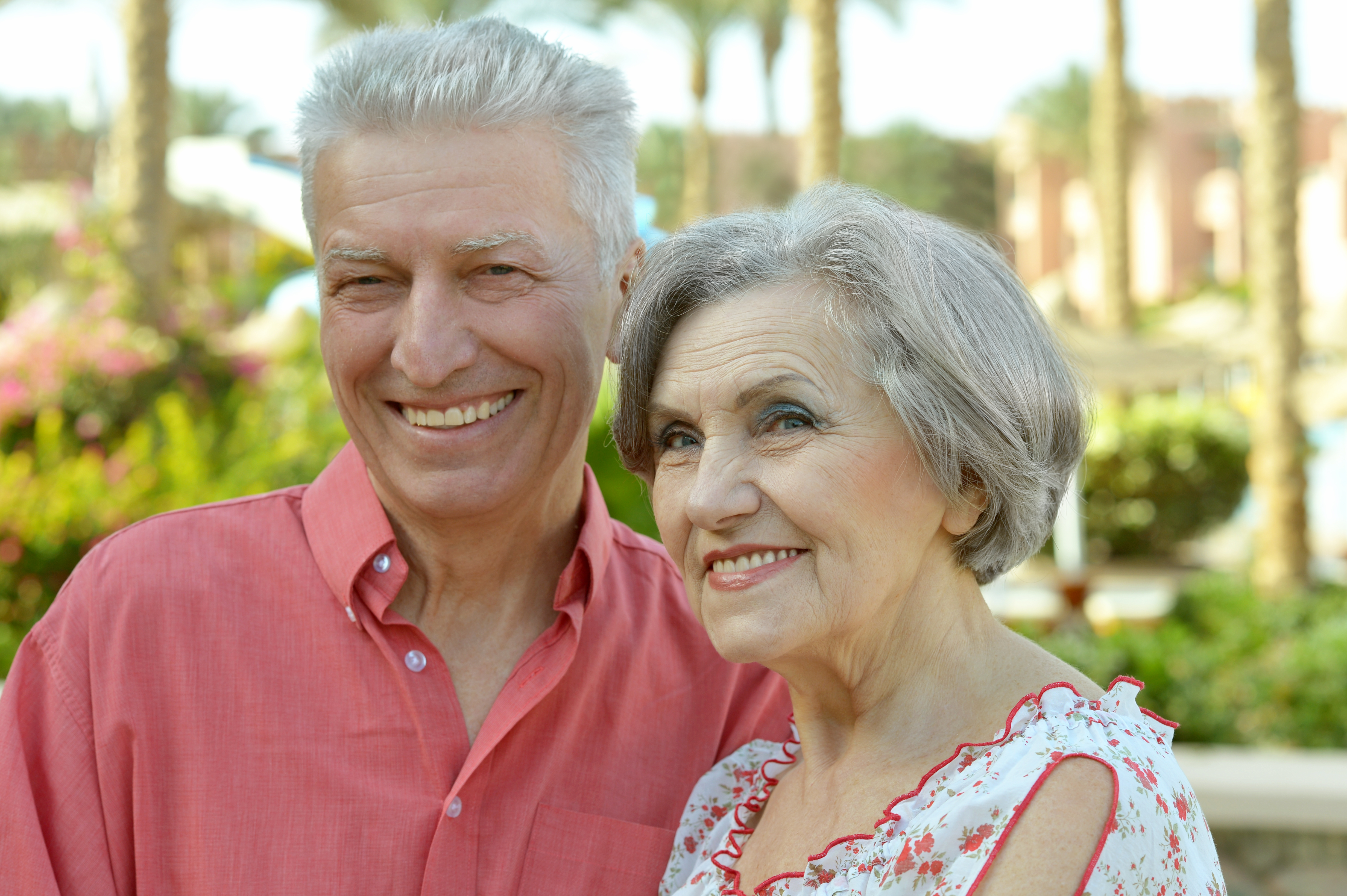 Happy senior Florida couple confident in their Medicare plan after working with a licensed local advisor