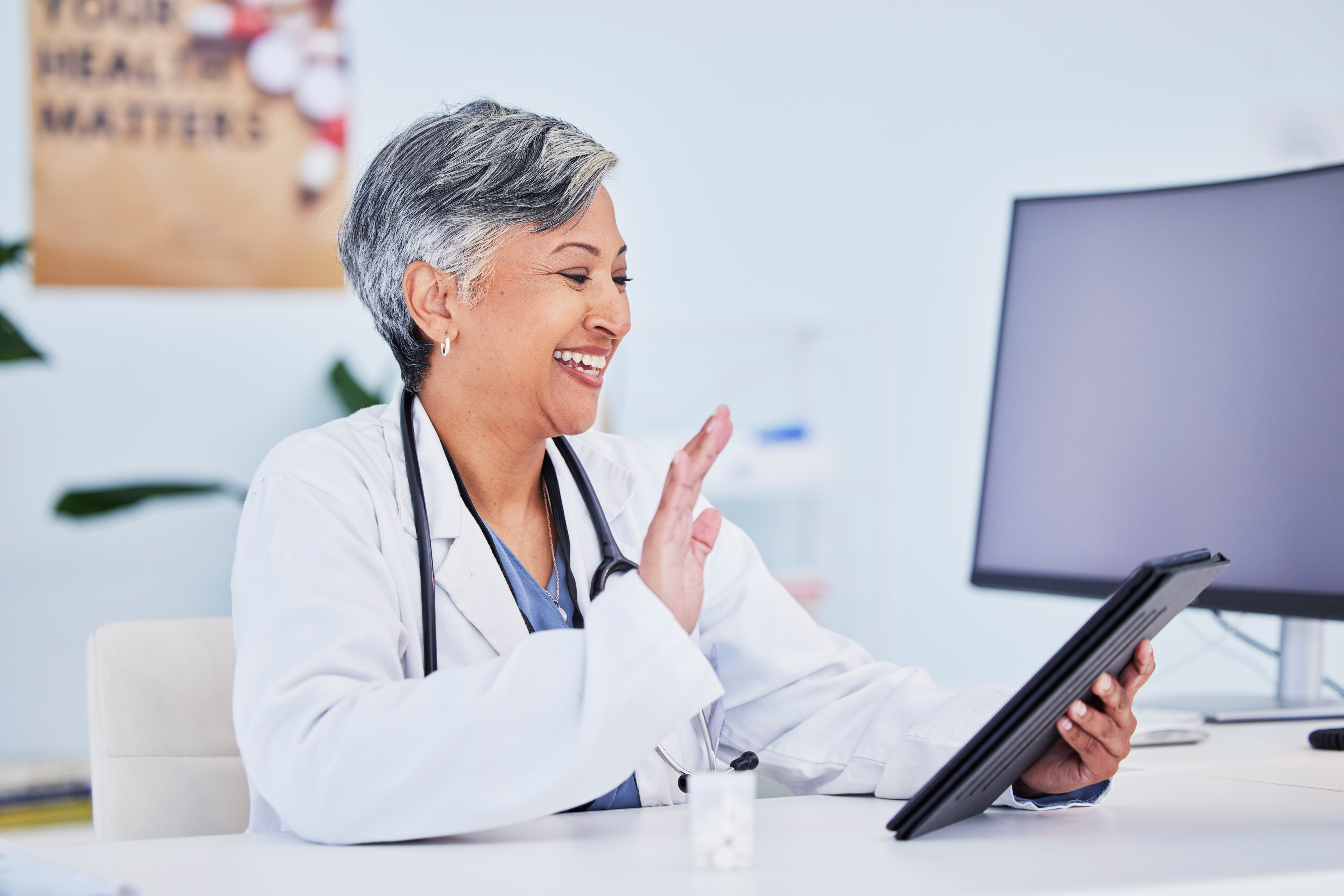 Florida doctor greeting a patient virtually