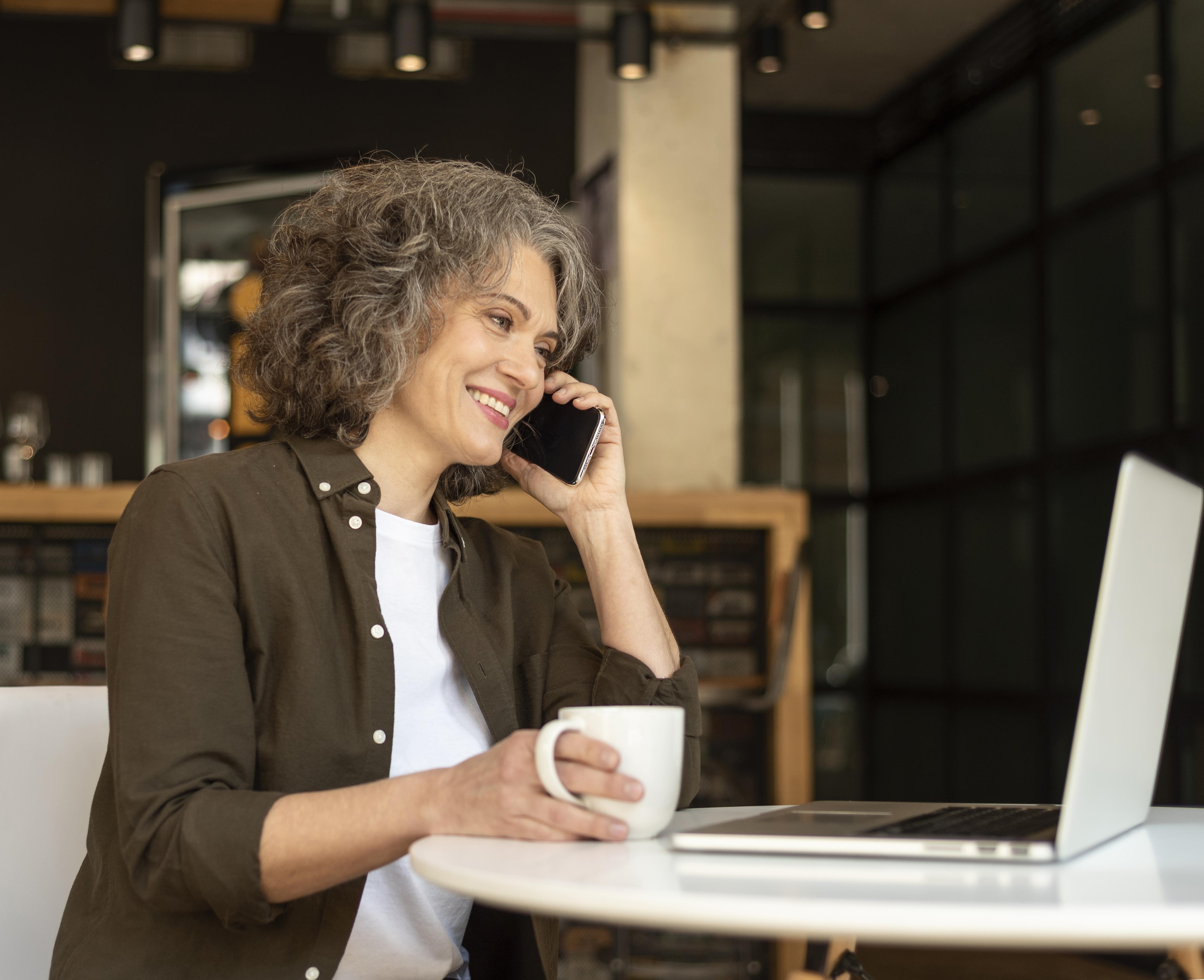 A woman on a phone call asking about her health coverage options after missing the Open Enrollment deadline