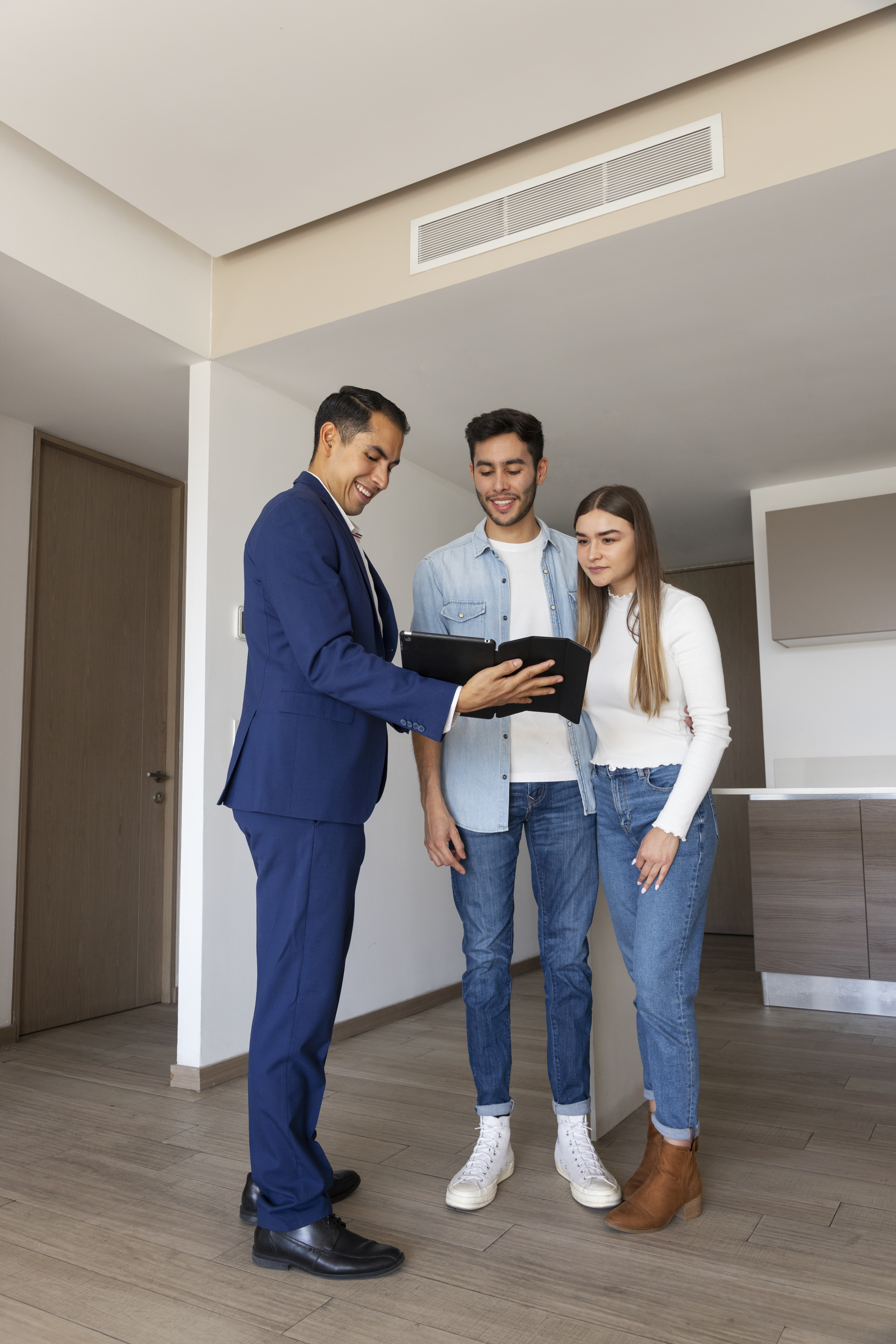 Florida real estate agent showing a home to clients